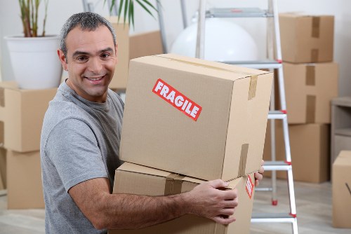 Local movers handling bulky household items in Watford