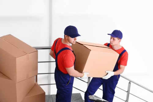 Packed moving boxes and furniture protection for a Watford house move