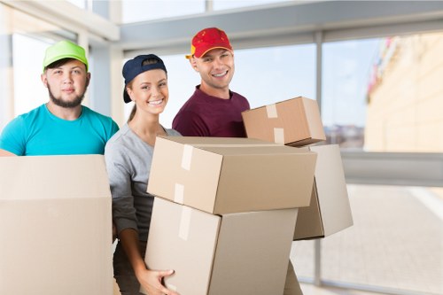 Local movers loading furniture for a Watford house move