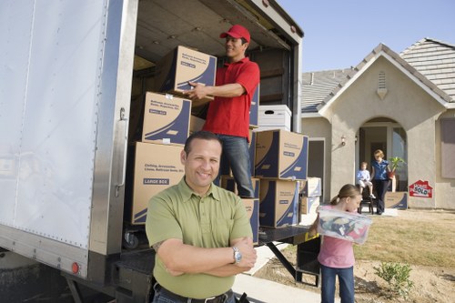 House move preparation with labelled boxes in Watford