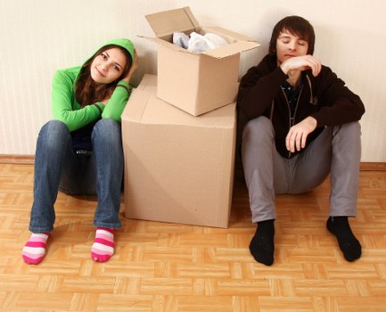 Office furniture and boxes prepared for transport during a Watford relocation