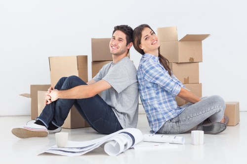 Packed office equipment prepared for commercial moves in Watford