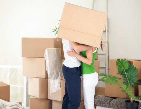 Securely arranged boxes and furniture inside a van